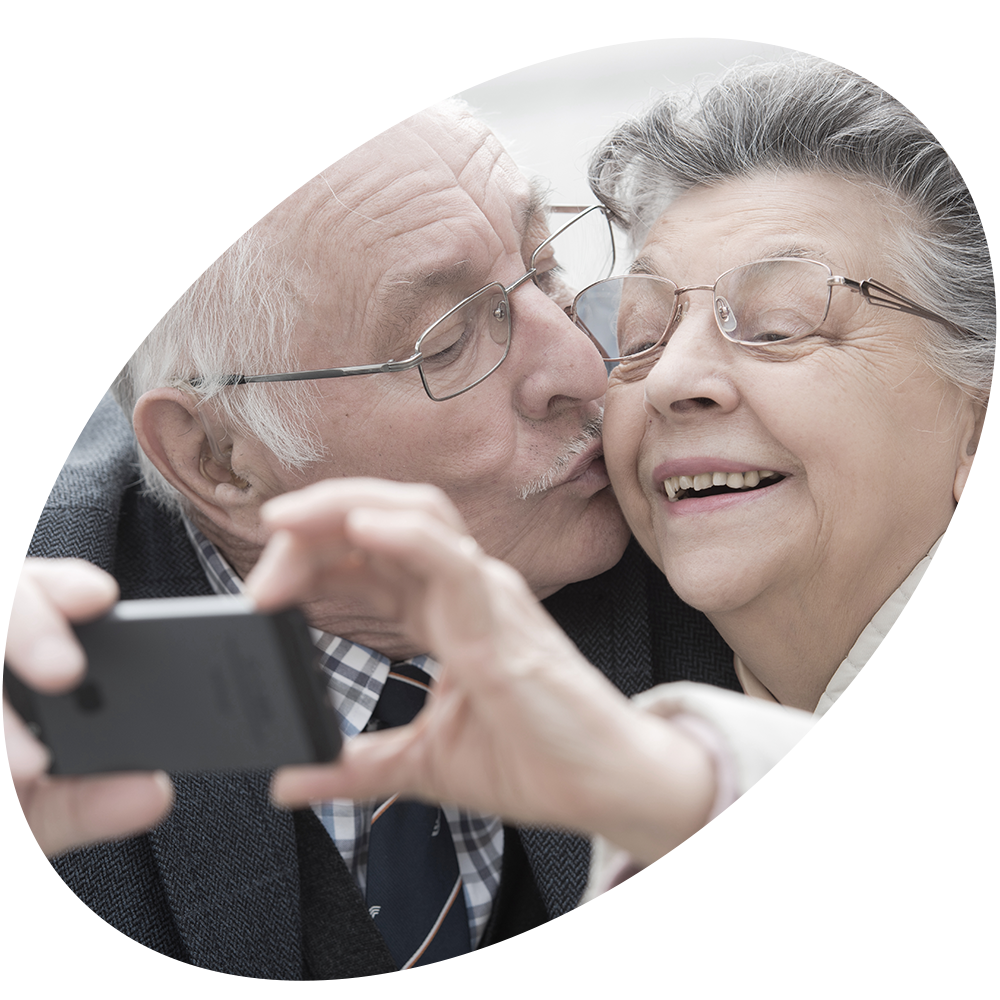Elderly couple taking a selfie